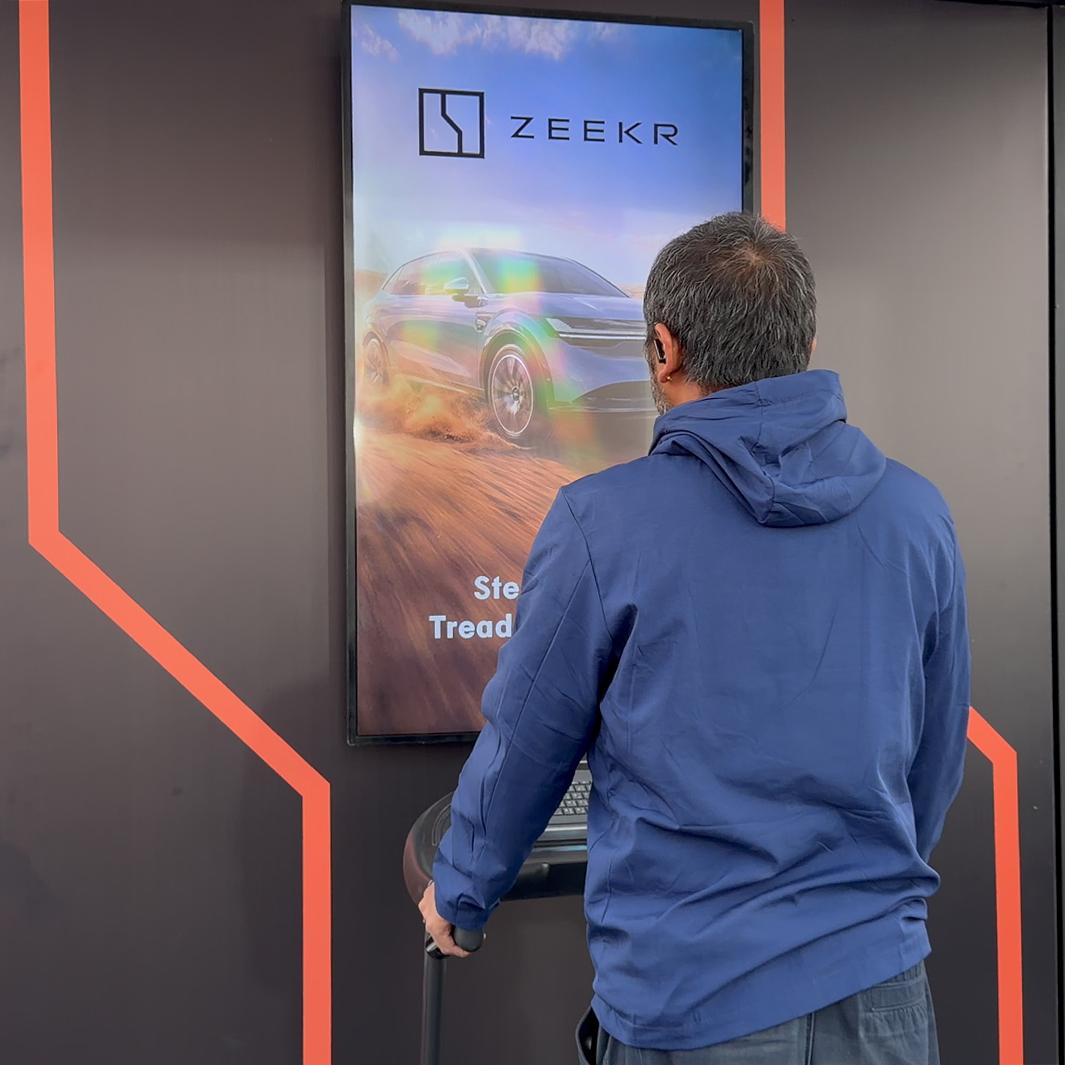 Interactive Treadmill Activation in Dubai: Participants generating human power to recharge EV cars